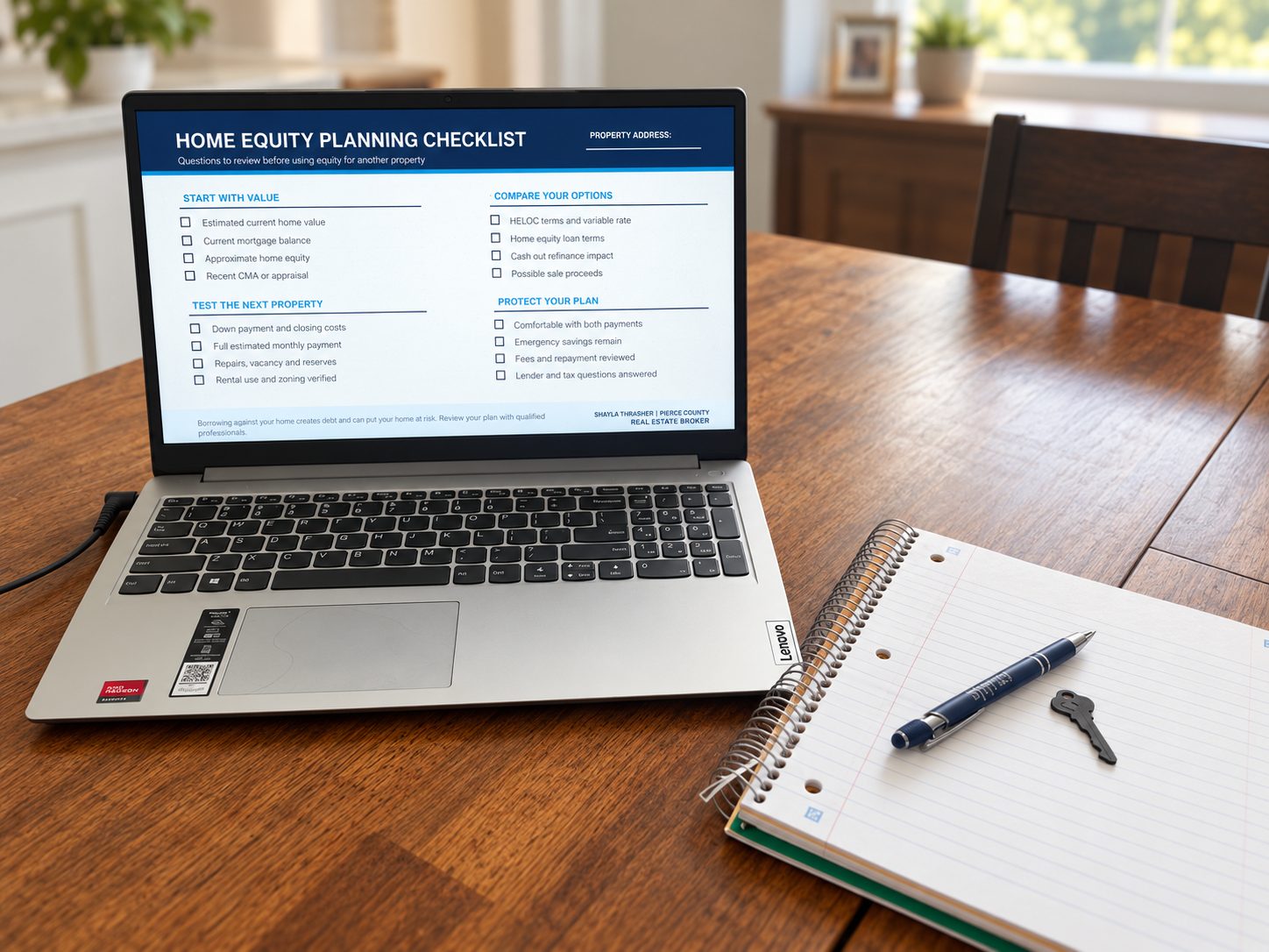 Pierce County home equity planning checklist displayed beside a notebook and house key